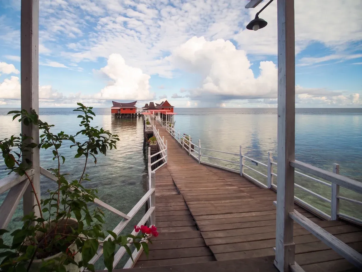 The wooden jetty extending 120 metres over the house reef