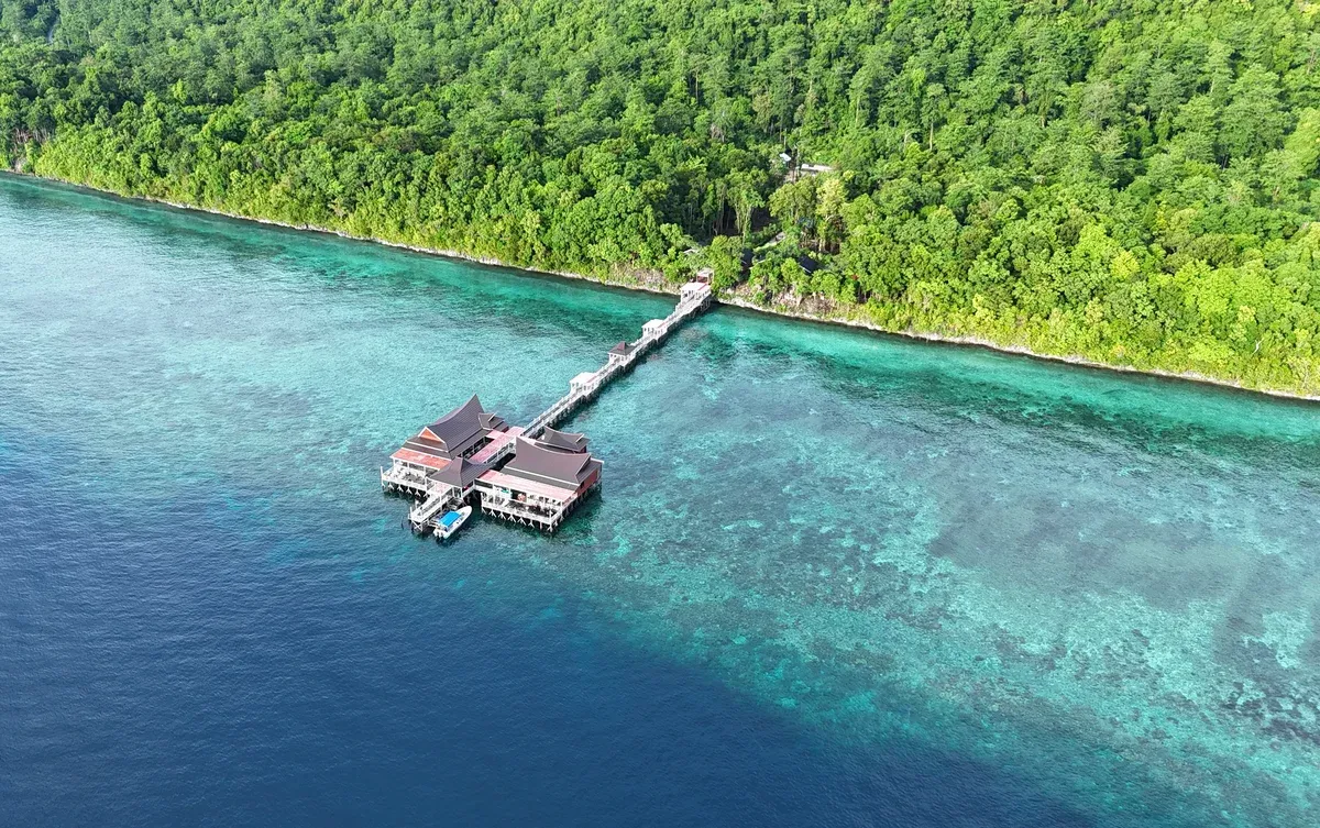 Aerial view of Maratua Dive Resort and its 120-meter wooden jetty