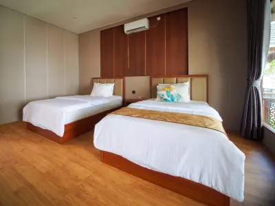 Seaview chalet twin bedroom